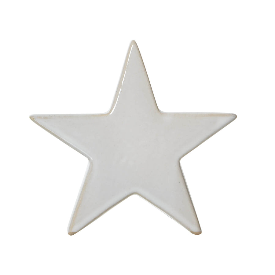 Handcrafted white ceramic star decor with minimalist design, casting enchanting light shadows, 12cm celestial accent piece. by Sostter at brixbailey.com