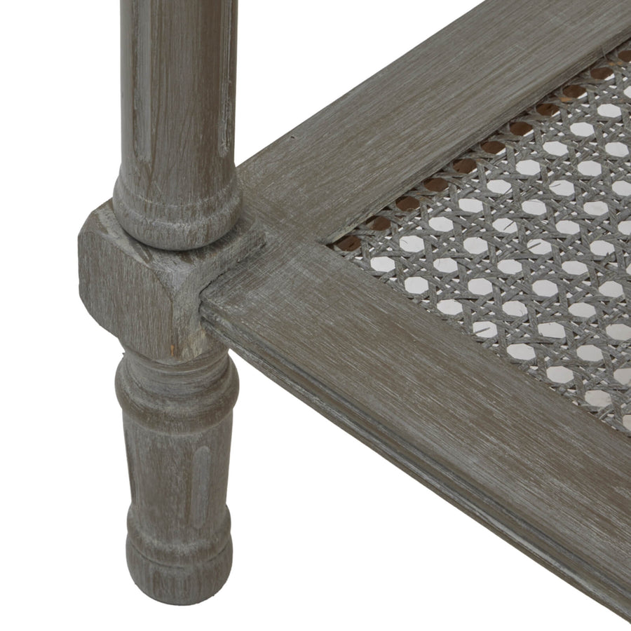 Handwoven rattan side table with tapered legs in soft grey, 60cm height, modern organic texture for coastal or minimalist decor by Sostter at brixbailey.com