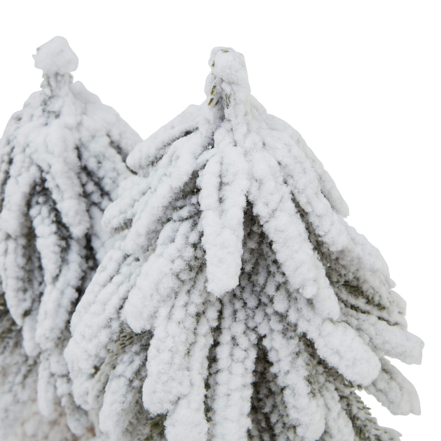 Snow-dusted fir tree duo on rustic wooden base, perfect for holiday decor and winter-themed centerpieces. by Sostter at brixbailey.com