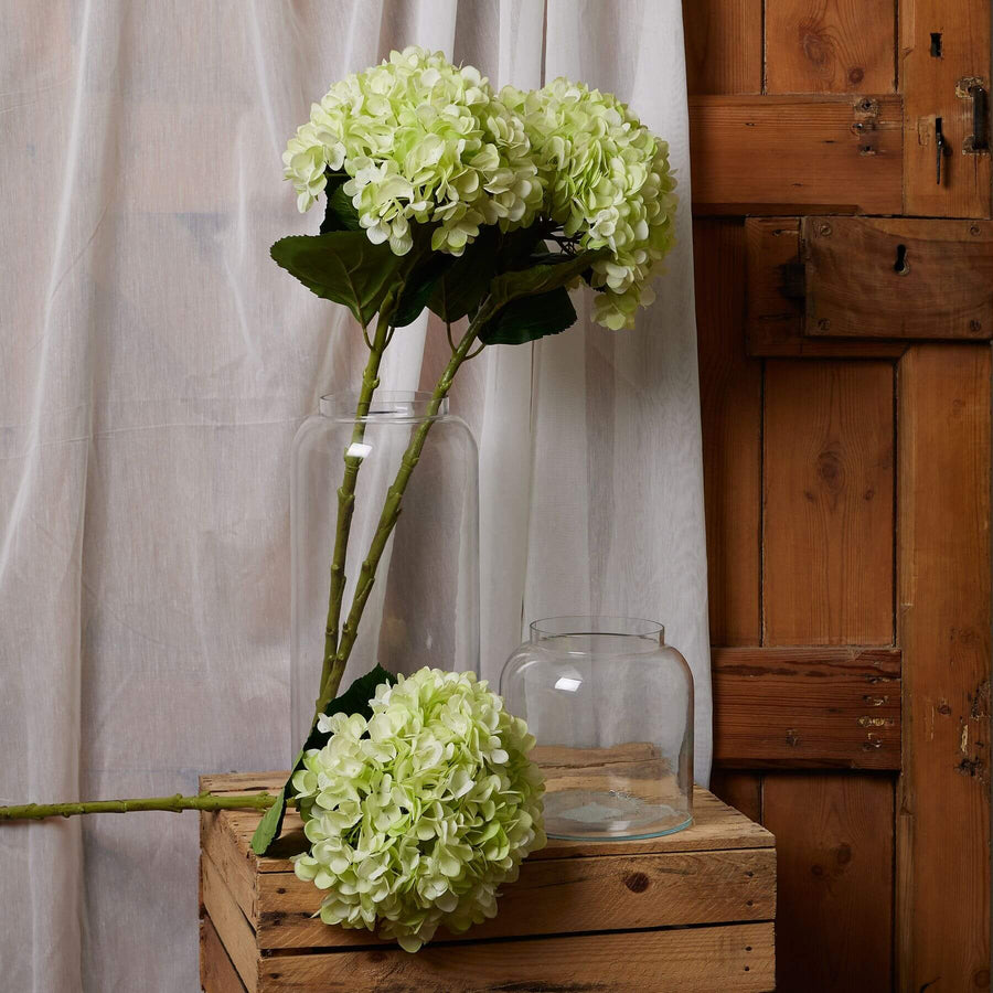 Oversized green hydrangea artificial flower arrangement with hand-painted petals for lifelike botanical decor by Sostter at brixbailey.com