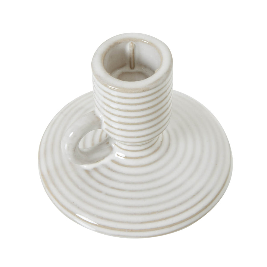 White ceramic taper candle holder with integrated handle, minimalist modern design, 10 cm height.by Sostter at brixbailey.com