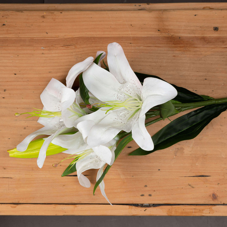 White artificial lily stems with 3 realistic blooms, perfect for home decor by Sostter at brixbailey.com