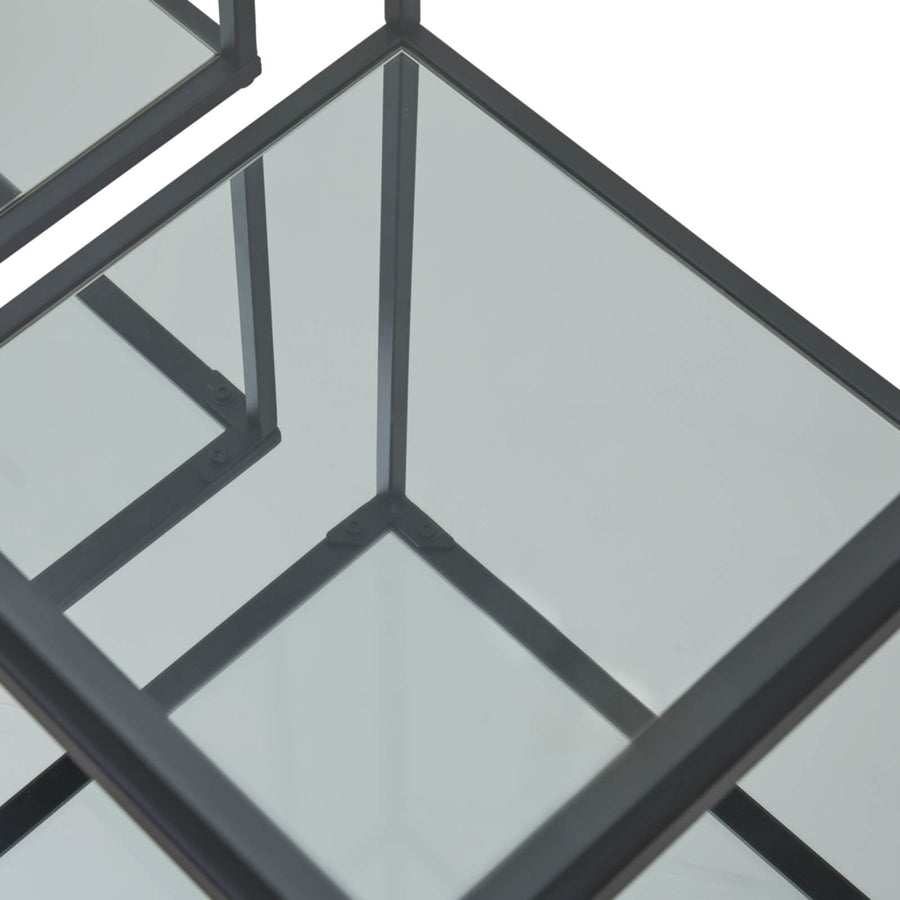Pair of modern black metal and glass side tables with minimalist design for contemporary living rooms by Sostter at brixbailey.com
