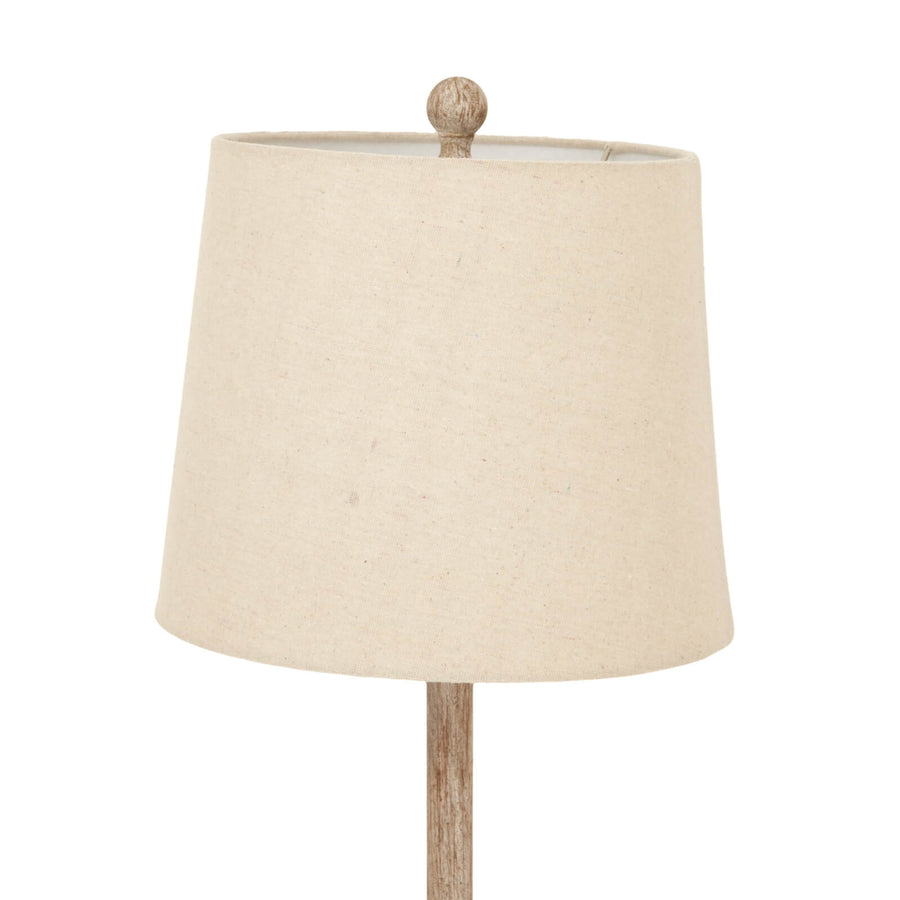 Brown candlestick table lamp with linen shade, warm ambient lighting for modern or traditional interiors. by Sostter at brixbailey.com
