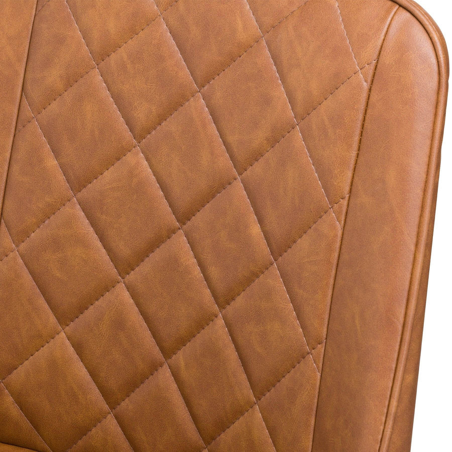 Scandinavian dining chair with diamond-stitched tan upholstery and metal frame by Sostter at brixbailey.com