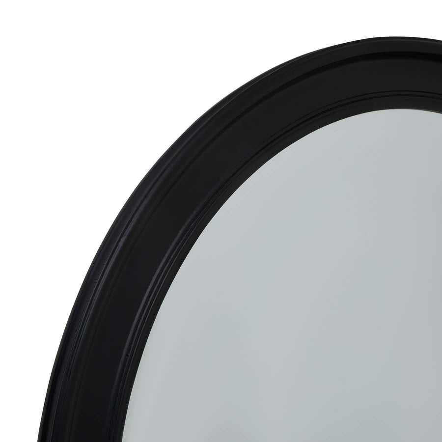 Black wood-framed round mirror, 120cm diameter, enhances light with elegant circular design for modern interiors by Sostter at brixbailey.com