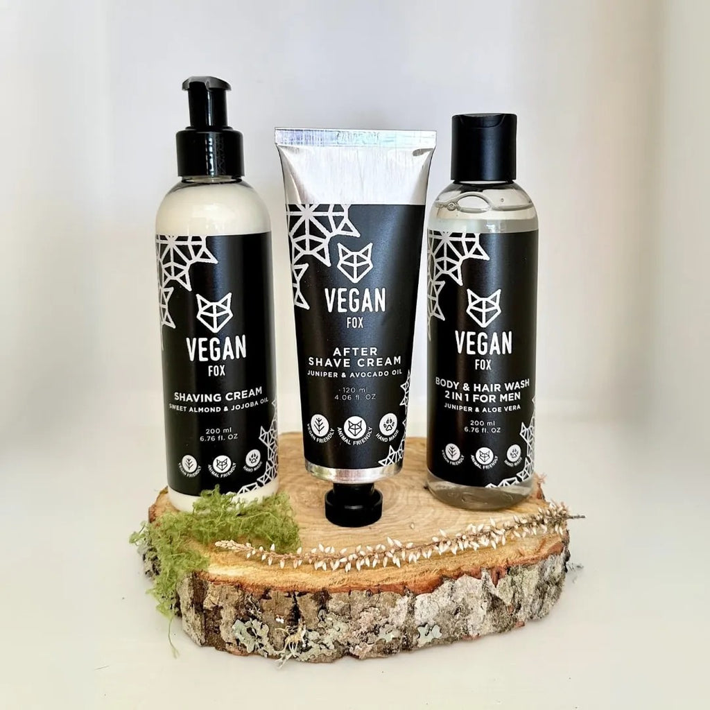 soft-lit men's body and face set with forest-scented products arranged on a wooden tray