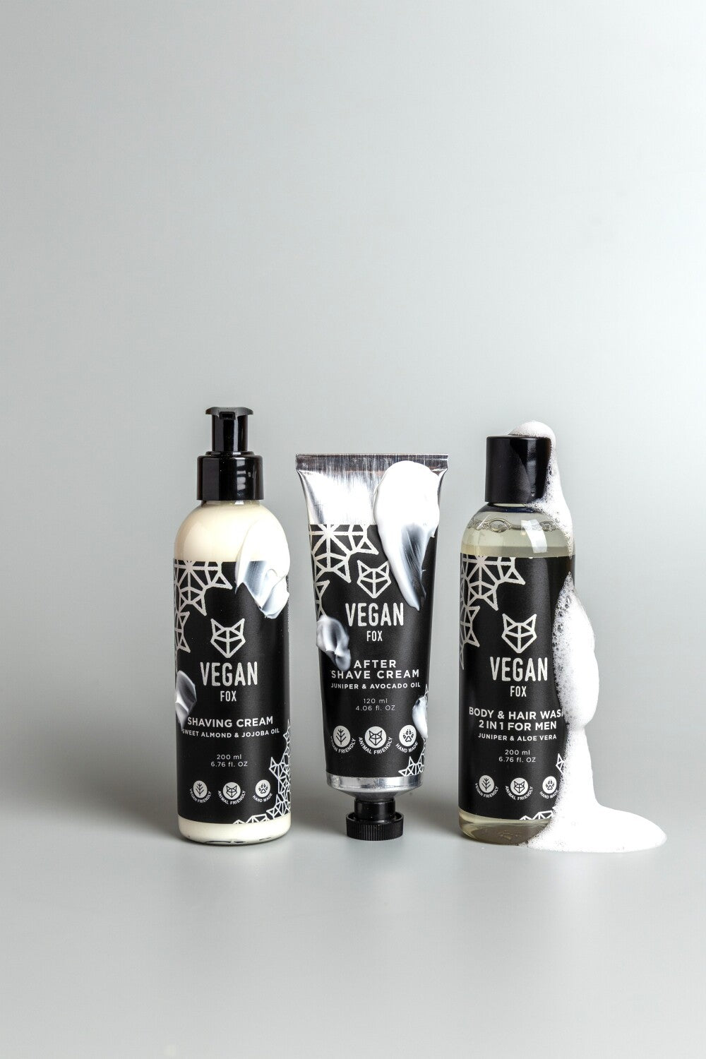 elegant men's body and face set with forest scent, featuring shaving cream and after-shave on marble