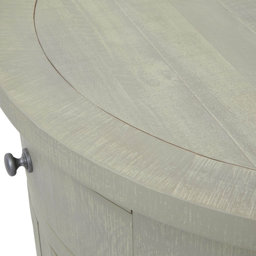 Hand-finished half-moon cupboard in warm grey weathered pine, modern organic design with curved silhouette. by Sostter at brixbailey.com
