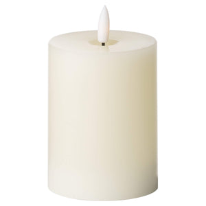 Premium ivory LED flameless candle with realistic flicker glow, safe for homes with kids and pets by Sostter at brixbailey.com