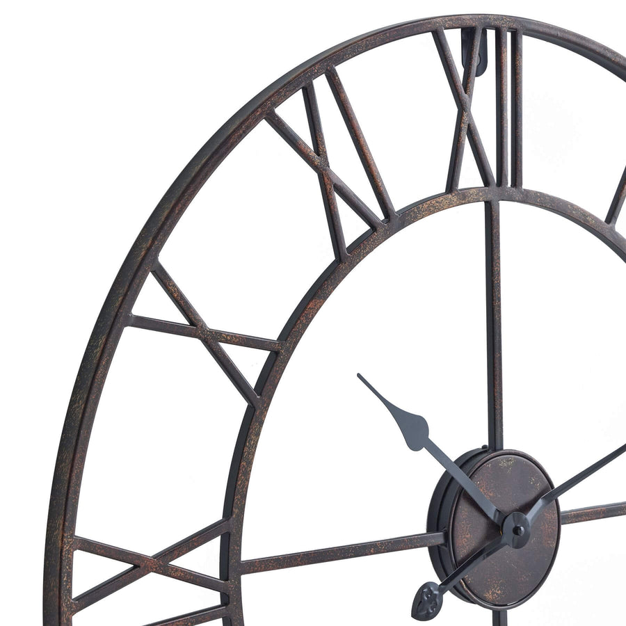 Antique bronze wall clock with open skeleton design, Roman numerals, and industrial elegance, 80cm diameter by Sostter at brixbailey.com