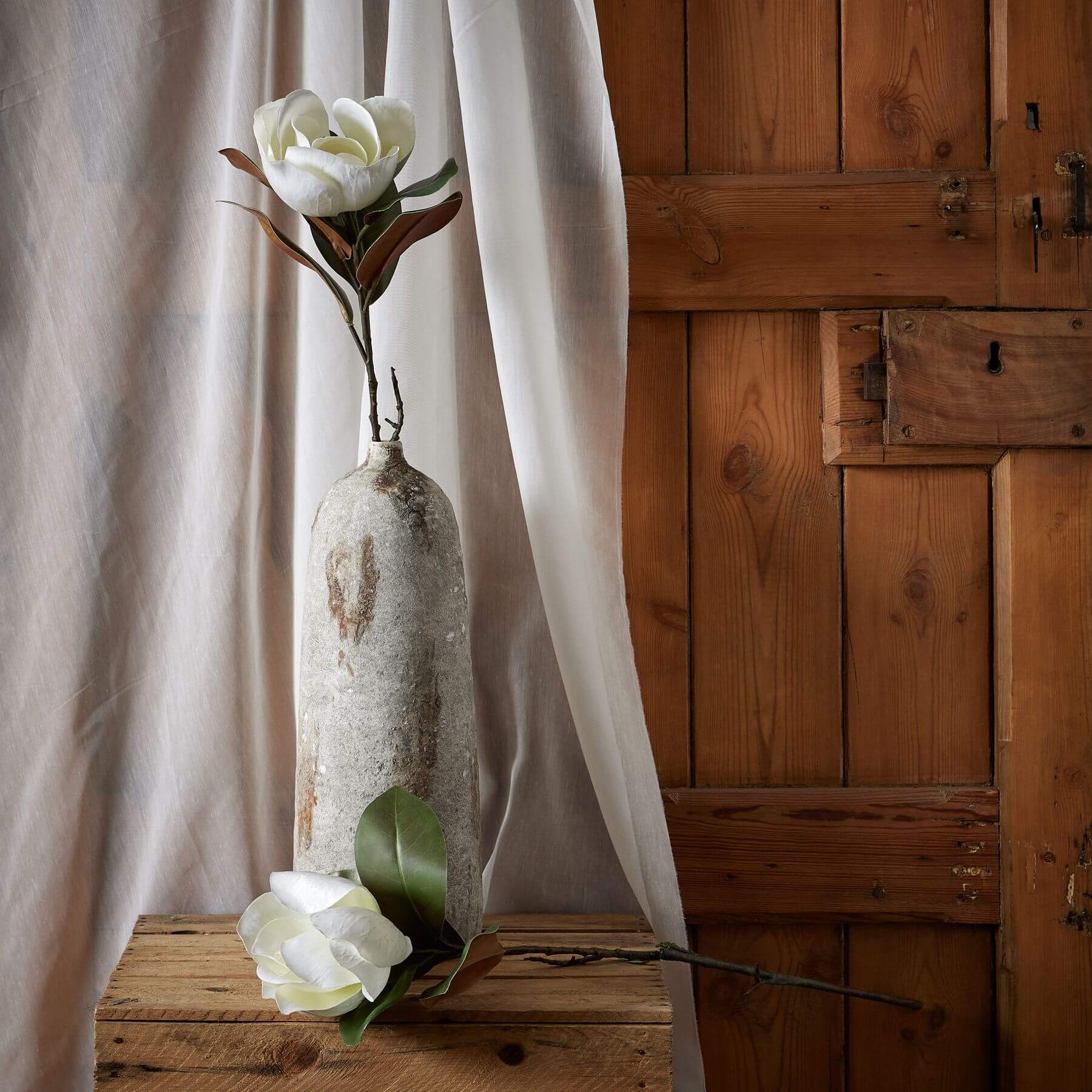 White artificial magnolia stem with realistic petals, perfect for home decor, 78 cm tall, premium plastic material by RoomLondon at brixbailey.com