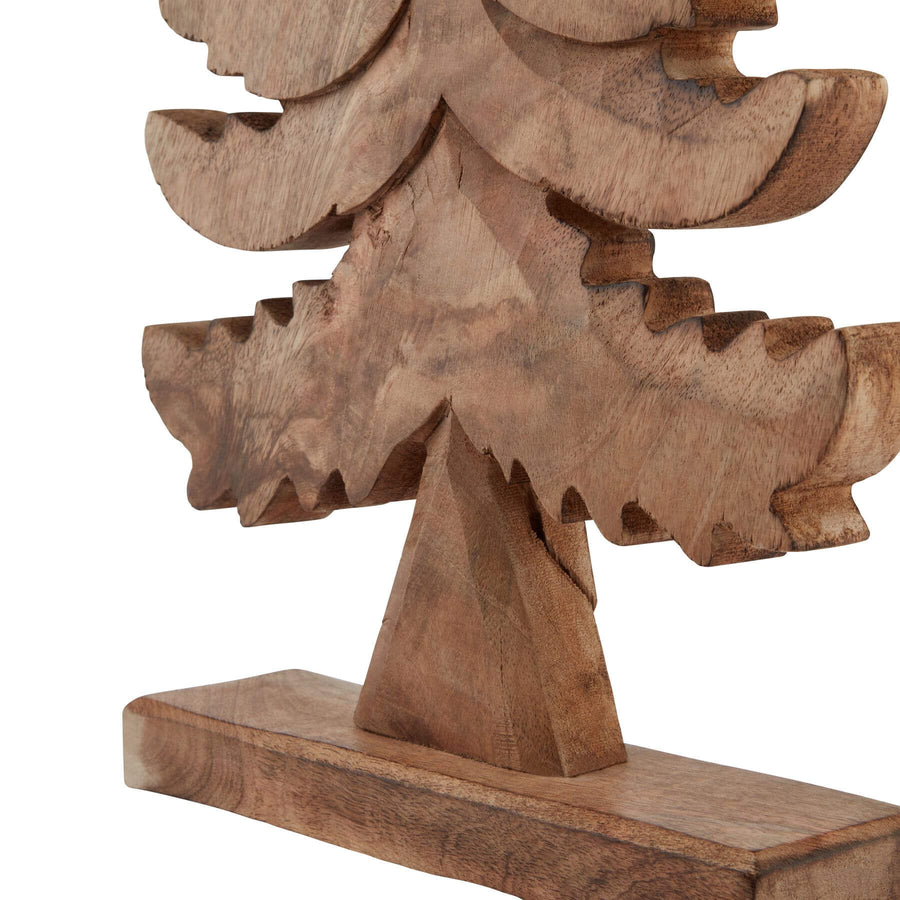 Handcrafted natural wooden Christmas tree with rich brown grain, minimalist silhouette, and artisan craftsmanship for holiday decor. by Sostter at brixbailey.com