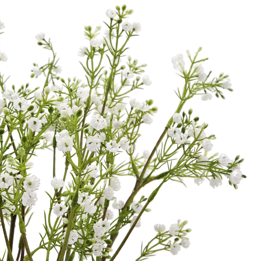 Lifelike artificial Lily of the Valley stem with white blooms and green foliage, 24-inch height, perfect for home decor by Sostter at brixbailey.com