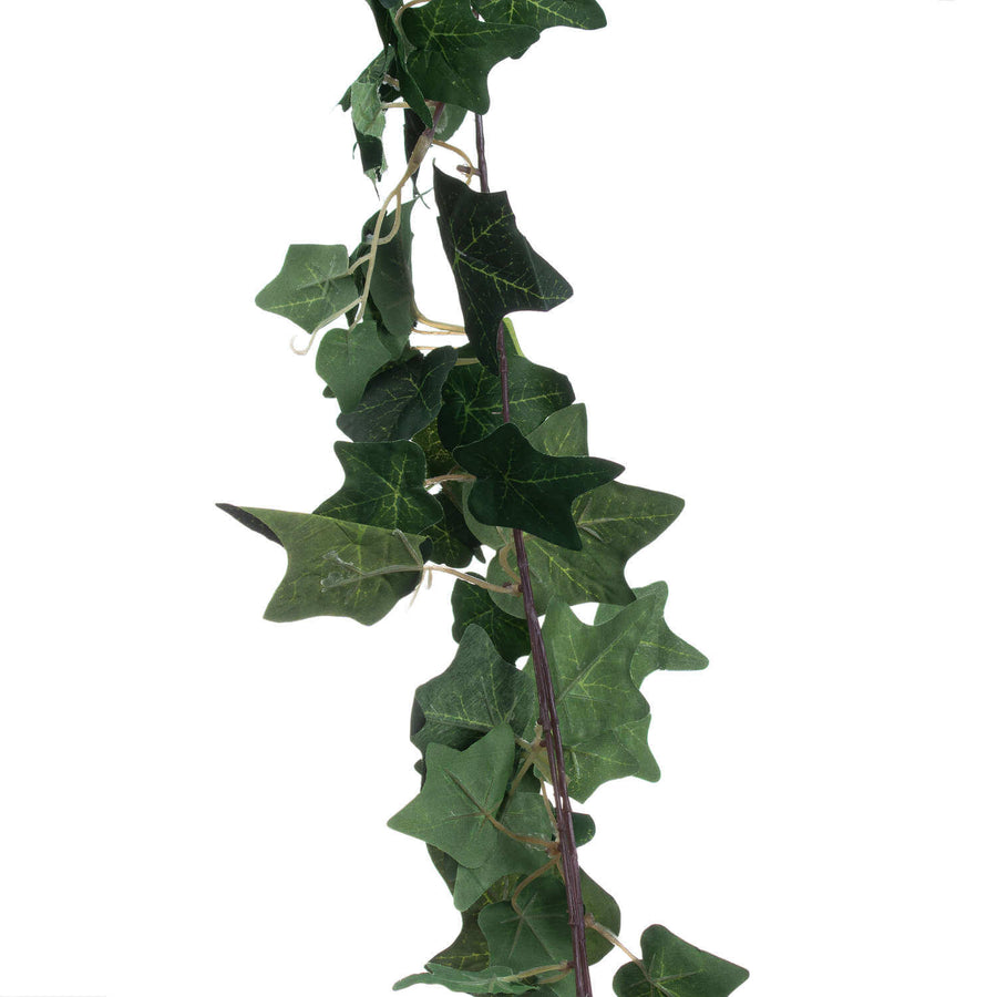 Lush artificial ivy garland with realistic silk leaves in natural green hues, perfect for mantels and wedding decor  by Sostter at brixbailey.com