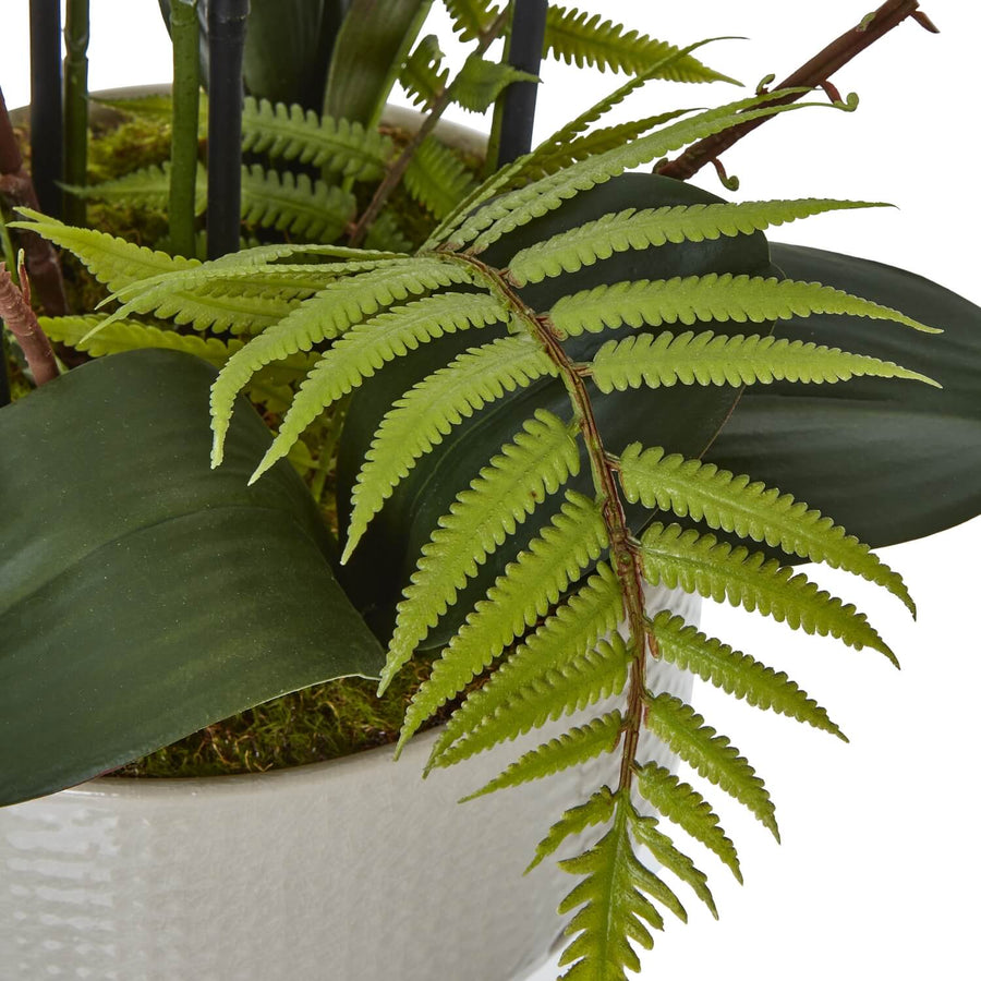 Large white faux orchid in ceramic pot with realistic phalaenopsis blooms and green foliage for elegant home decor by Sostter at brixbailey.com