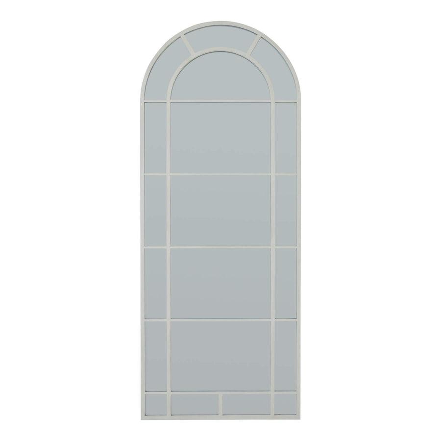 White arched window mirror with Gothic-inspired detailing in wood frame, enhancing room light and space perception. by Sostter at brixbailey.com