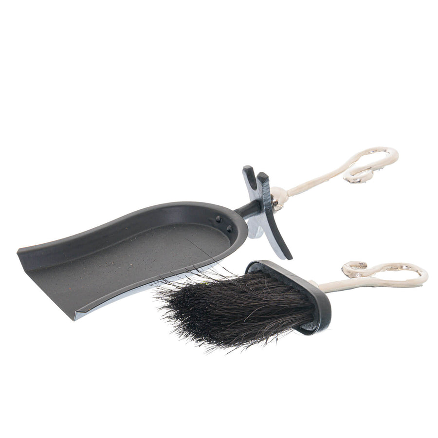 Chrome crook-handled hearth tidy with polished silver finish for fireplace maintenance and elegant decor by Sostter at brixbailey.com