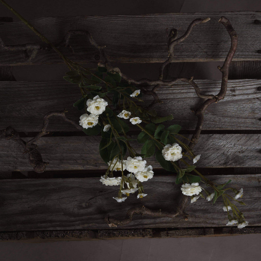 White wild meadow rose floral spray with lifelike plastic petals, perfect for minimalist home decor. by Sostter at brixbailey.com