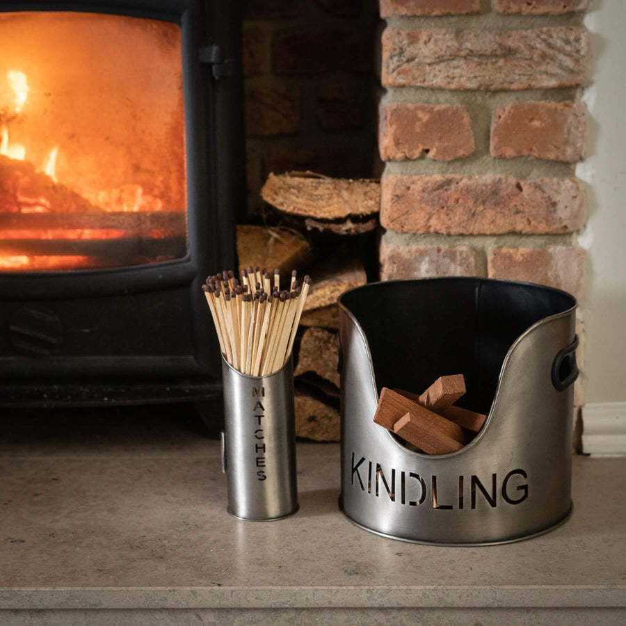 Handcrafted aged pewter fireplace log and matchstick set with rustic charm, integrated holder, and hand-cut lettering. by Sostter at brixbailey.com