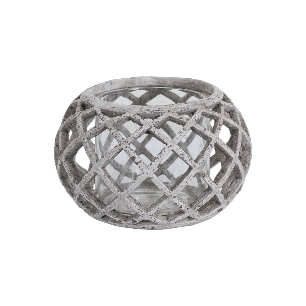 Round ceramic lattice hurricane lantern in natural stone with intricate cutouts, 17cm wide, ideal for LED candles. by Sostter at brixbailey.com