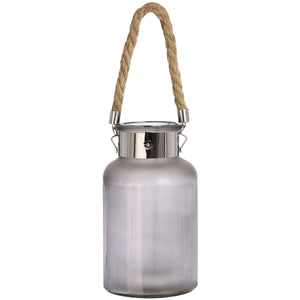 Frosted grey glass lantern with rope handle and warm LED glow, creating a starlight effect for indoor or outdoor decor. by RoomLondon at brixbailey.com