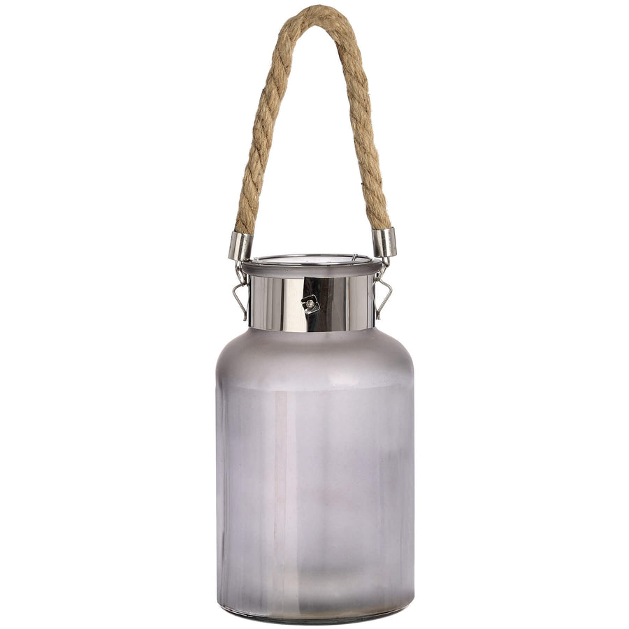 Frosted grey glass lantern with rope handle and warm LED glow, creating a starlight effect for indoor or outdoor decor. by Sostter at brixbailey.com