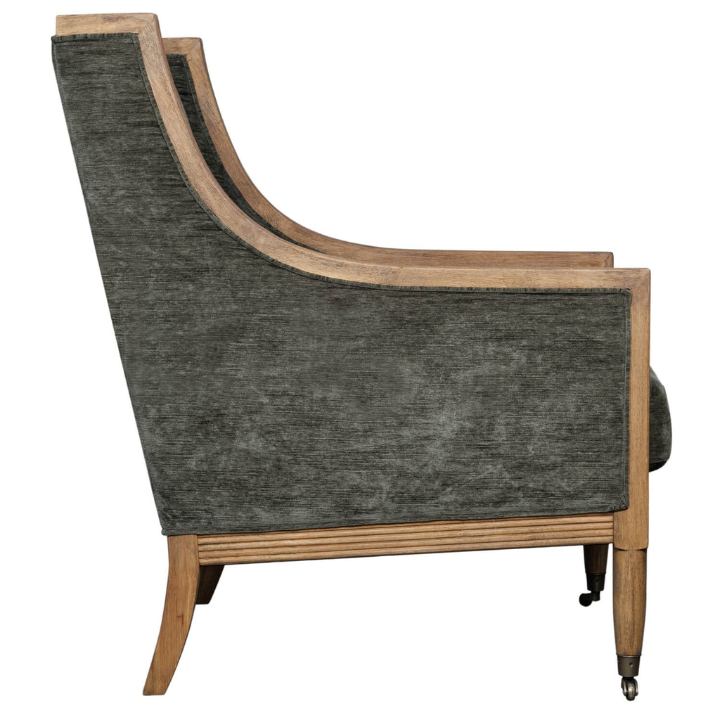 Albury Olive Armchair with velvet upholstery and wooden frame in ergonomic curved design by Sostter at brixbailey.com