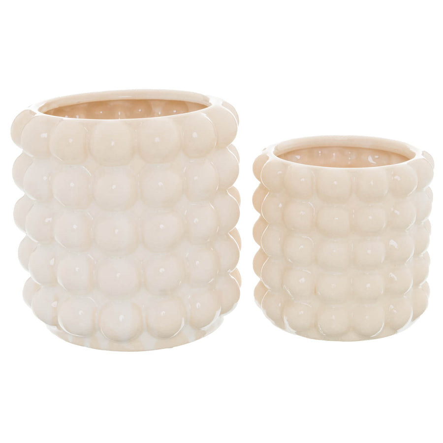 Handcrafted cream ceramic planter with bubble texture, perfect for tabletop plants or floral arrangements. by Sostter at brixbailey.com