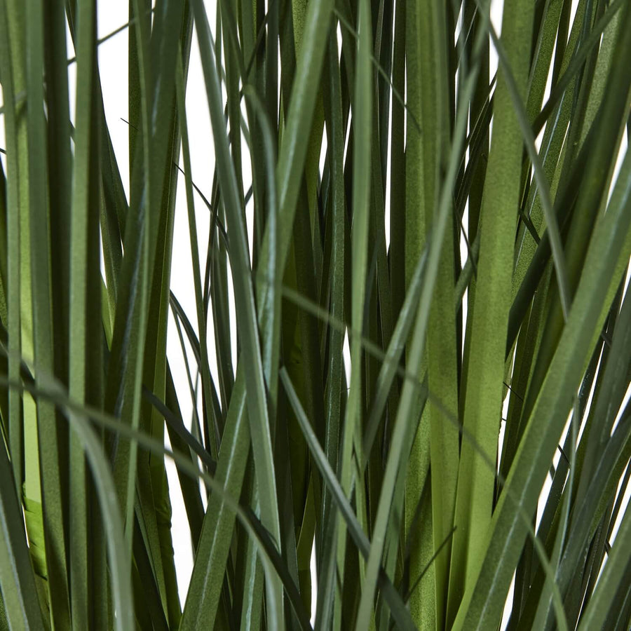 White faux agapanthus arrangement in black pot, lifelike plastic blooms with green foliage, 120cm tall by Sostter at brixbailey.com