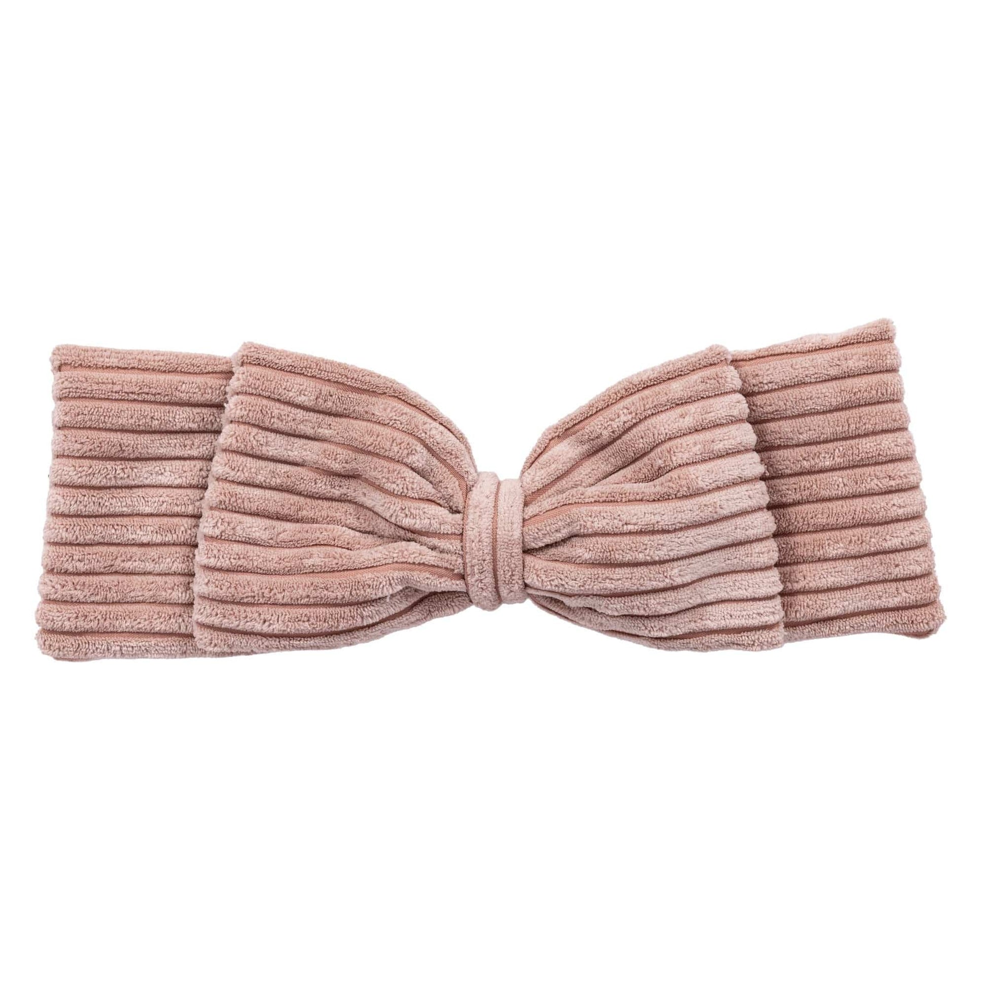 playful powder pink baby nest with a soft braided bumper for tummy time fun