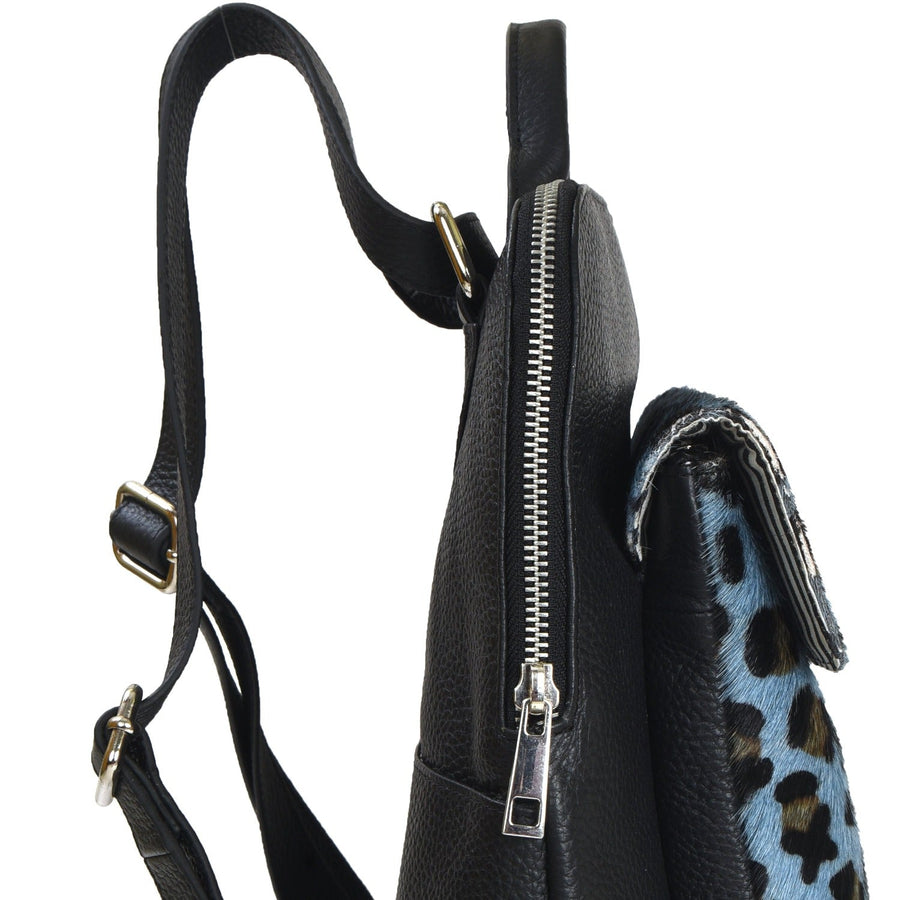 Blue Animal Print Leather Backpack – Stylish & Eco-Friendly by Brix + Bailey at brixbailey.com