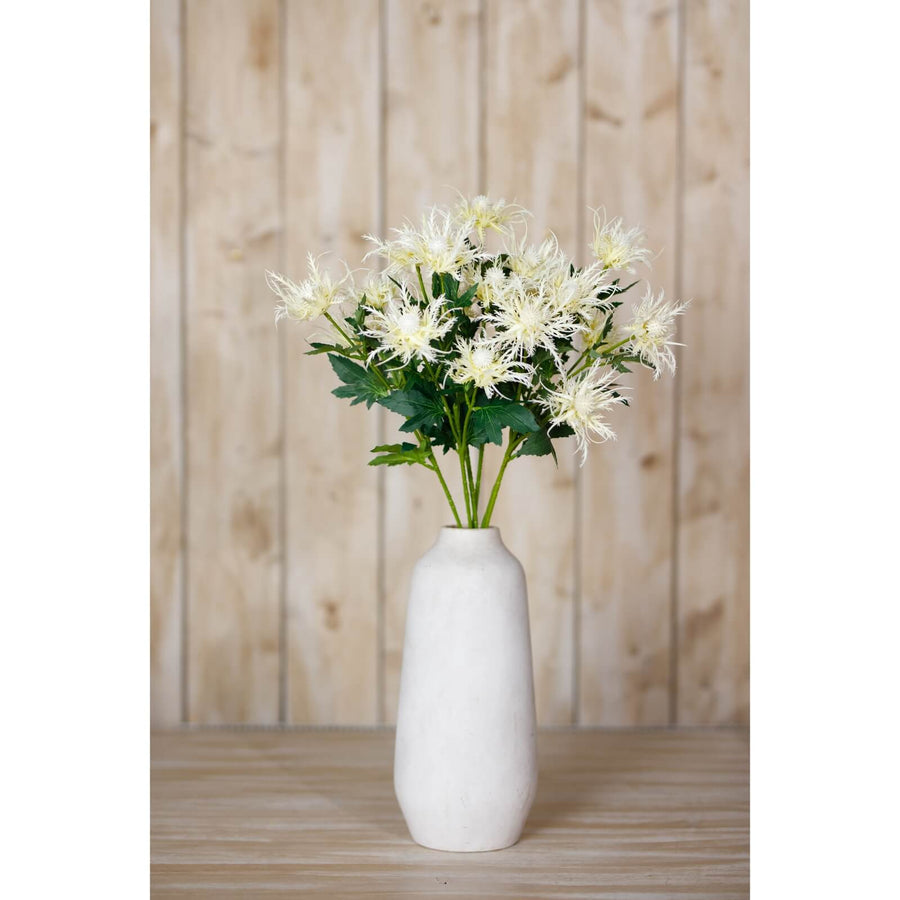 Cream faux sea holly spray with lifelike feathery blooms, 67cm coastal decor floral in soft cream by Sostter at brixbailey.com