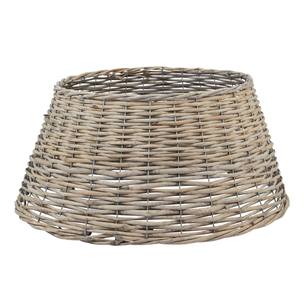 Handwoven wicker Christmas tree base cover in rich brown, 55cm wide, with natural texture for elegant holiday decor by Sostter at brixbailey.com