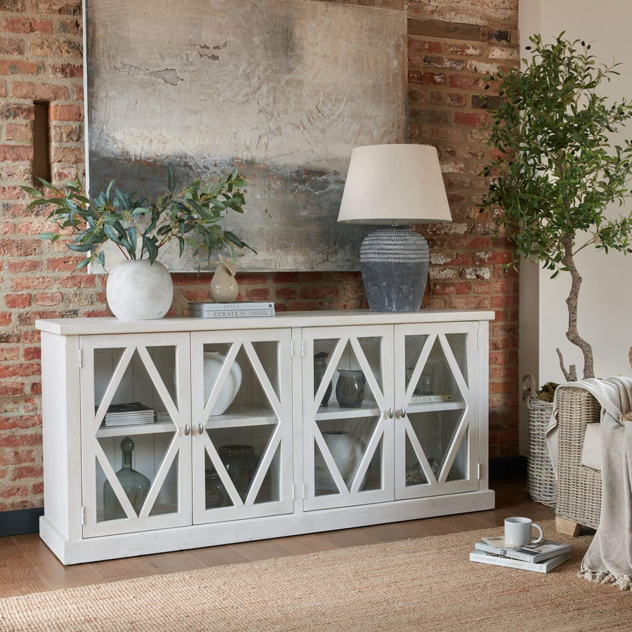 Lifelike faux olive tree, 180cm tall with natural green foliage, perfect for Mediterranean-style home or office decor by Sostter at brixbailey.com