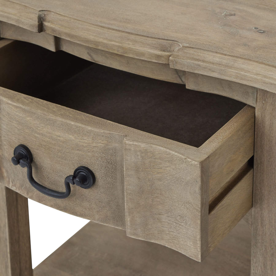 Handcrafted French provincial side table with hardwood construction, bleached wood finish, and black iron handles. by Sostter at brixbailey.com