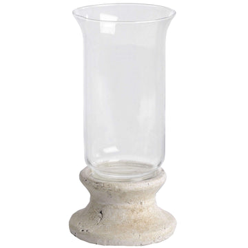 Handcrafted cream hurricane lantern with stone-effect base and antiqued patina, casting warm LED candlelight glow. by Sostter at brixbailey.com
