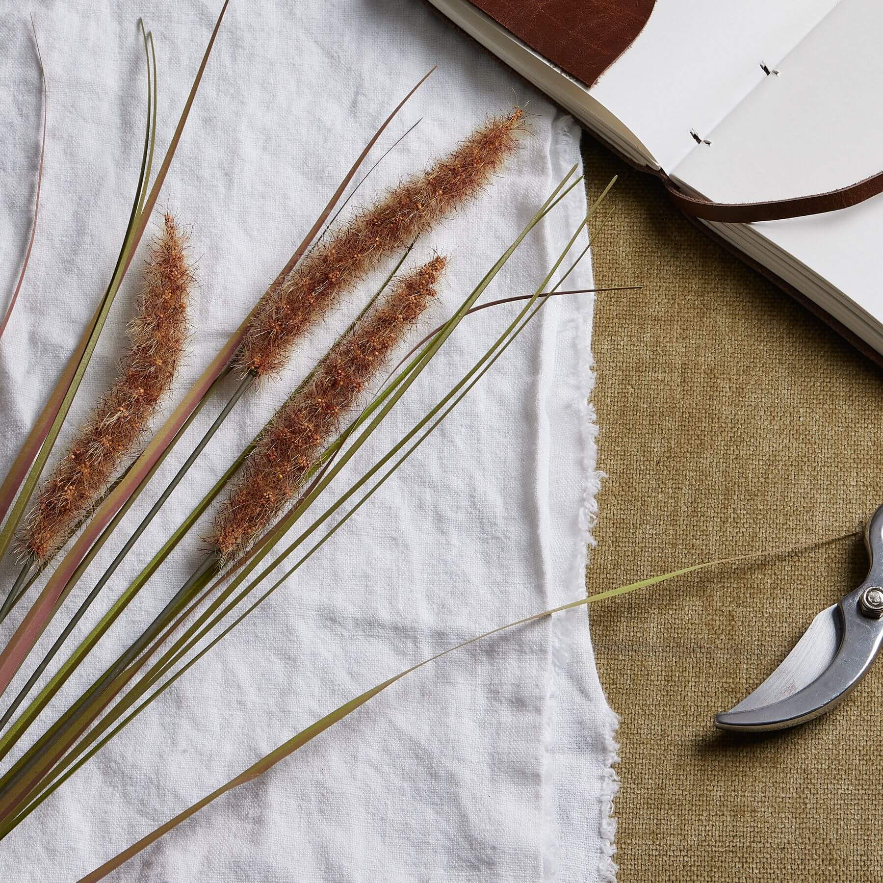 Terracotta grass stems in warm brown, 80cm tall, set of three lifelike artificial meadow grasses for home decor by Sostter at brixbailey.com
