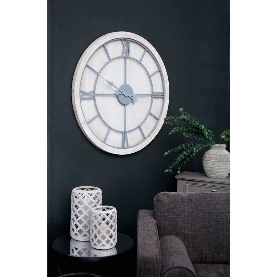 Large white wall clock with roman numerals, metal frame, and wood surround for modern or traditional decor. by Sostter at brixbailey.com