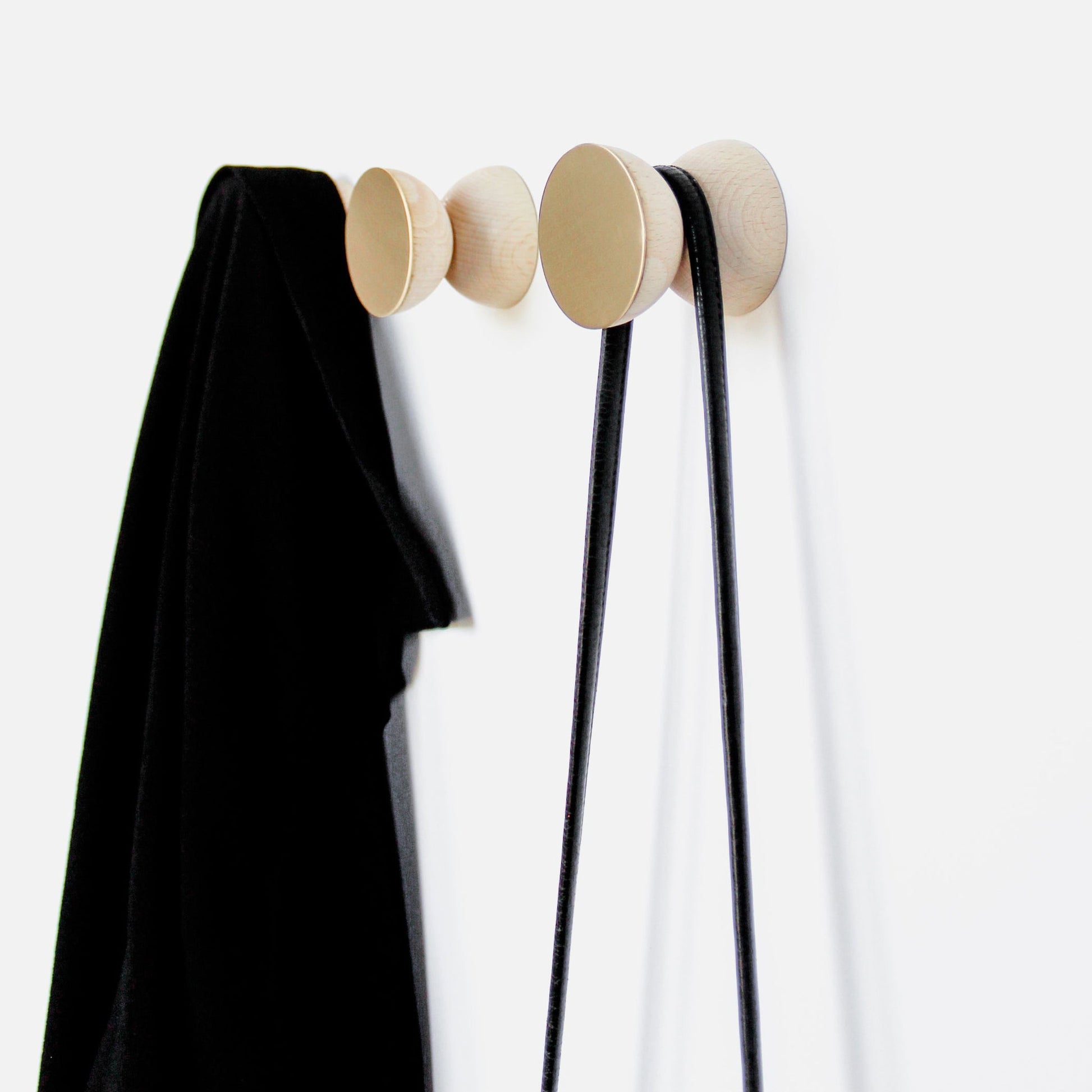 bold geometric beech wood and brass wall hook with a confident, modern silhouette