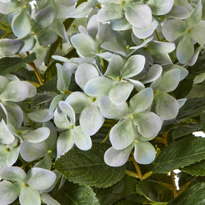 Lifelike faux green hydrangea plant with white blooms, lush foliage, and natural green color for home decor (124 chars) by Sostter at brixbailey.com