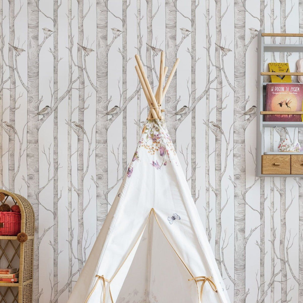 soft morning light on birch forest wallpaper for a calming kids room decor