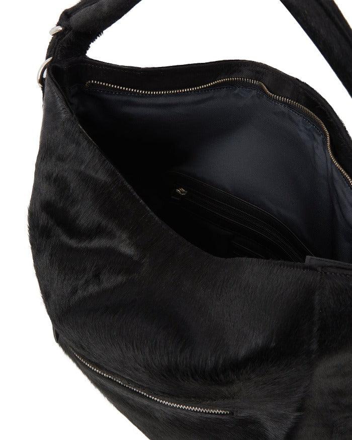 Black Leather Top Handle Grab Bag – Elegant & Versatile by Brix + Bailey at brixbailey.com