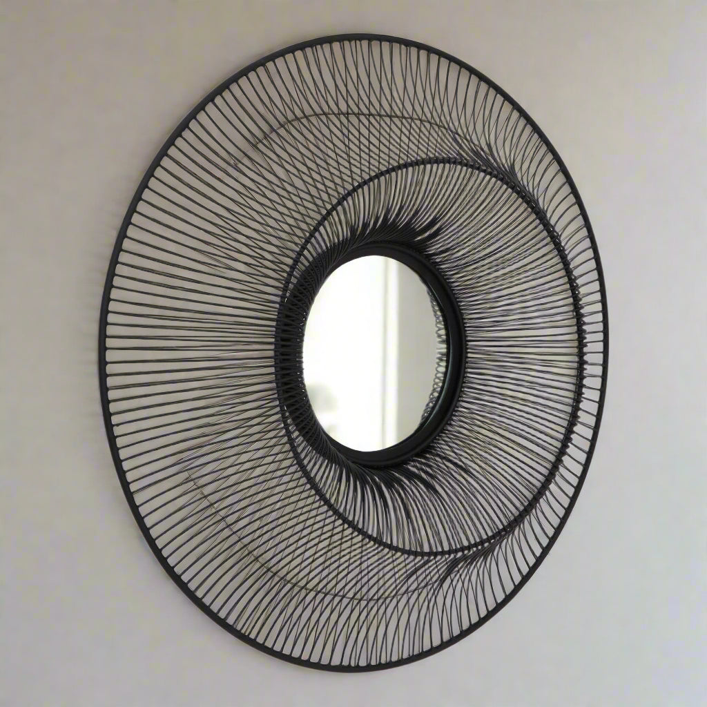 Black wire-framed mirror with industrial design, 61cm square, sleek matte finish for modern interiors. by Sostter at brixbailey.com