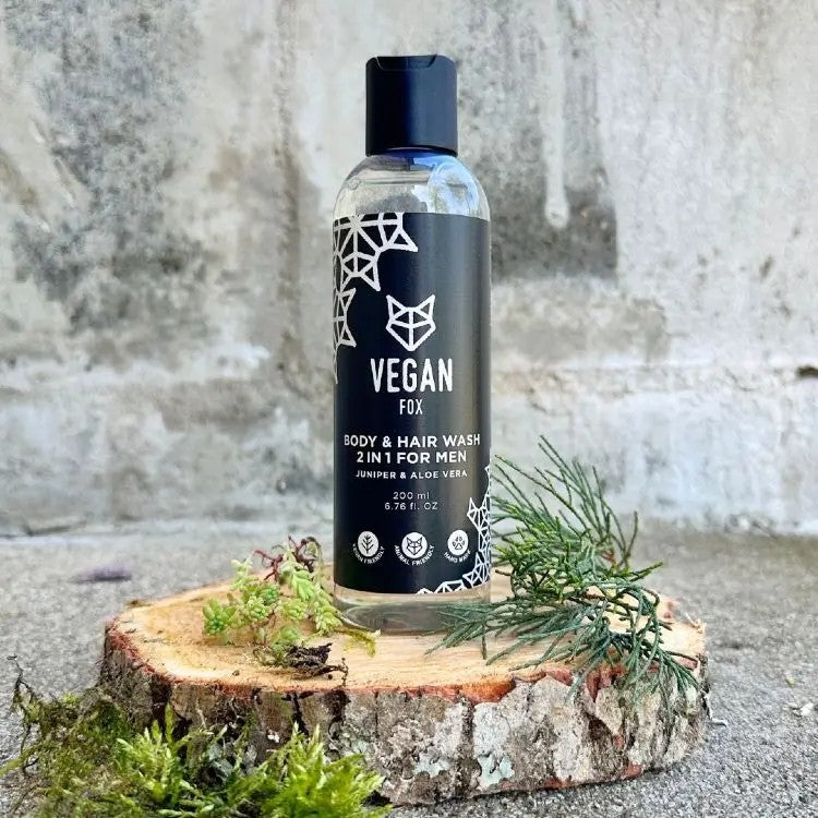 bold black bottle of vegan men's 2in1 body & hair wash with fresh forest scent, aloe vera, and juniper berry extract