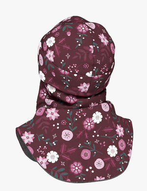 bold kids merino balaclava with winter flowers on a stark background