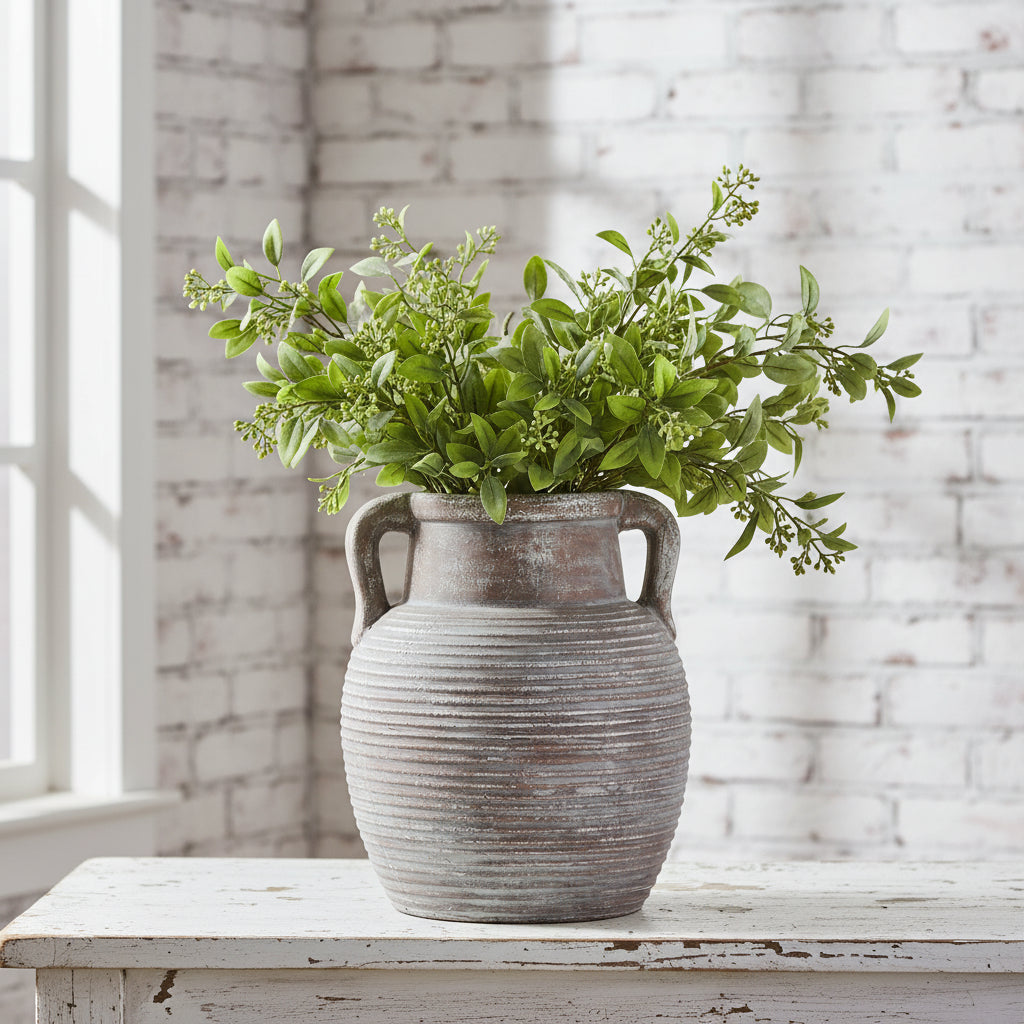 Hand-finished brown ceramic amphora pot with ribbed detailing and rustic weathered finish for home decor. by Sostter at brixbailey.com