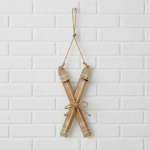 bold rustic wooden skis wall art in dramatic low-angle lighting brix and bailey marketplace