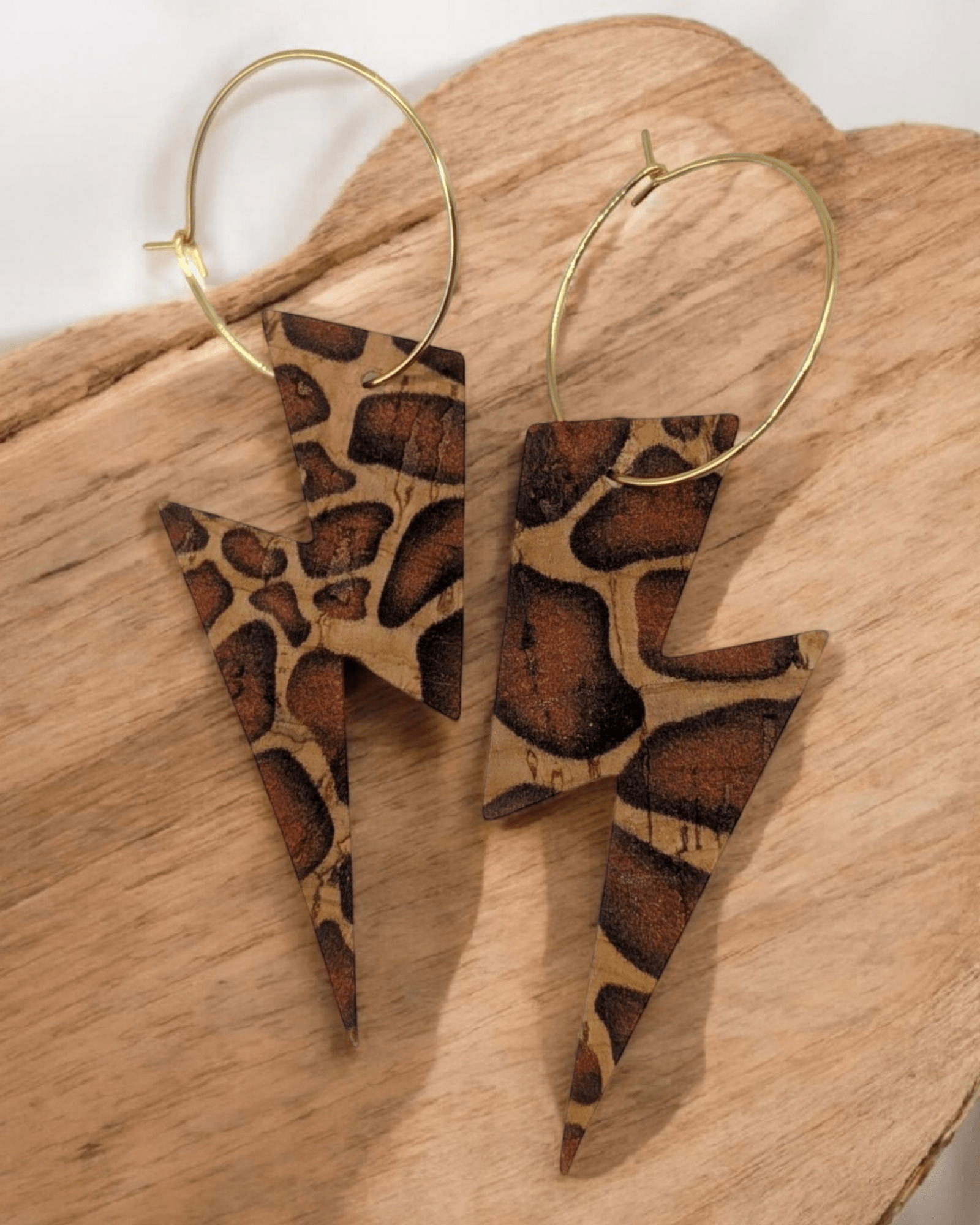 Brown cow cork lightning bolt earrings