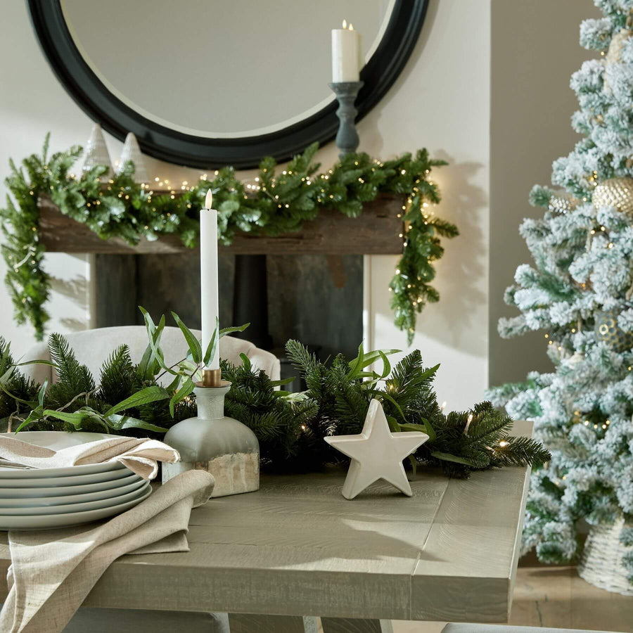 Handcrafted white ceramic star decor with minimalist design, casting enchanting light shadows for home accents. by Sostter at brixbailey.com